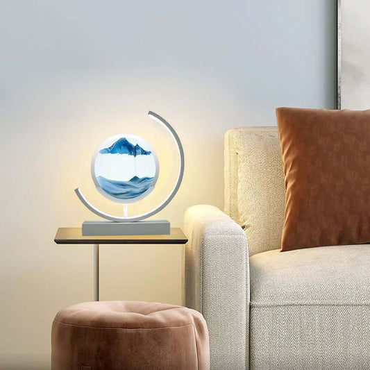 Glass Flowing Sand Colored Painting Lamp on a side table, creating a cozy ambiance in a modern living room.