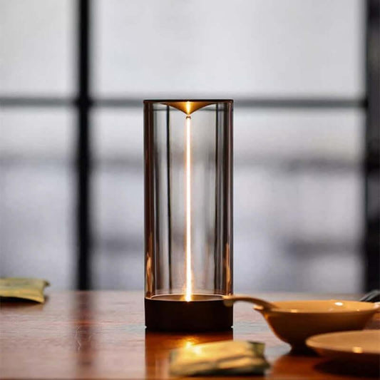 Magnetic Quantum Light lamp on a wooden table, featuring sleek design and soft adjustable lighting.