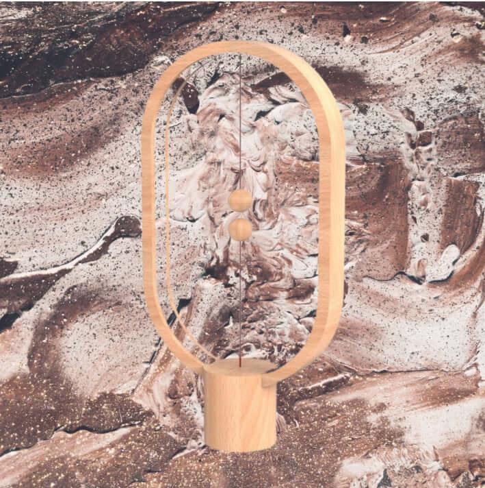 Elegant Magnetic Ornament LED lamp in wood finish with magnetic pull switch against a textured background.