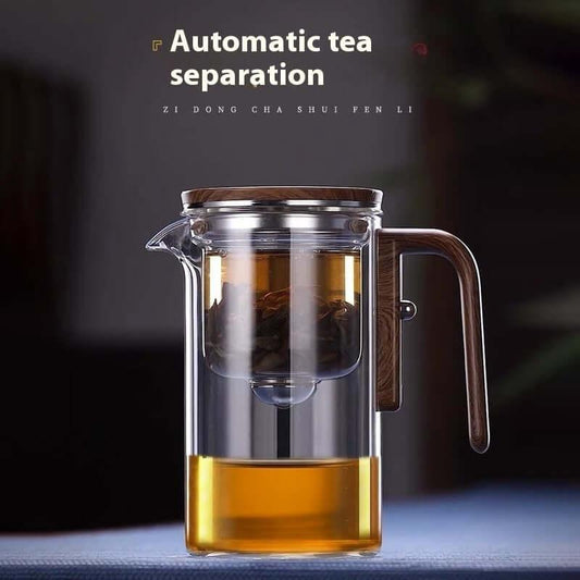 Elegant glass infuser teapot with automatic tea separation technology for the perfect brew.