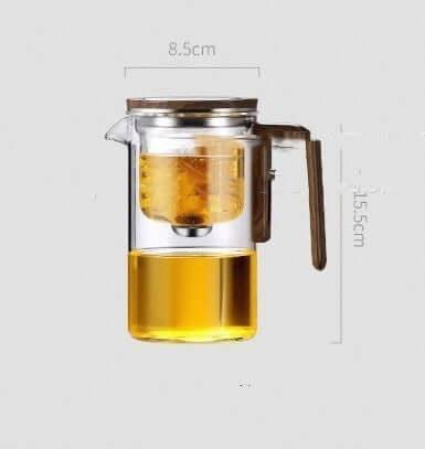 Elegant glass tea infuser teapot with wooden handle, featuring innovative water separation technology for perfect brewing.
